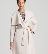 A shawl collar and belted wrap silhouette lend an effortless feel to this minimalist Calvin Klein Premium coat. Perfect for wrapping up in style on a blustery city day.