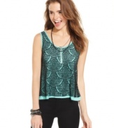 A dark, open-knit overlay makes this top from Material Girl a cool pick for summertime style!