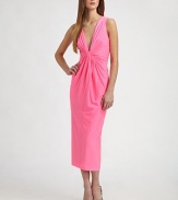 This colorful stretch jersey style is finished with a flattering, sexy twist-front detail.Plunging necklineSleevelessTwist-front detailSlight racerbackVertical back seamFully linedAbout 33 from natural waist95% polyester/5% spandexDry cleanMade in USA of imported fabricModel shown is 5'10 (177cm) wearing US size 4. 