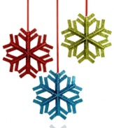 Snowed in. Add of touch of shimmer and sparkle to your tree with this set of six glittered snowflakes in blue, red and green hues for a festive finish.