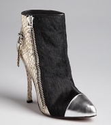 Jet black calf hair and snake embossed leather make a bold pairing on these edgy Jean-Michel Cazabat booties.