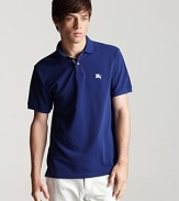 From Burberry comes a classic polo in three vibrant hues--the perfect staple, offering timeless wearability.