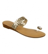 Twinkle toes. Show off your perfect pedicure with the revealing Turin demi-wedge sandals from Carlos by Carlos Santana.
