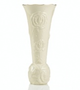 With lush roses and delicate dots carved in ivory porcelain, this classic vase offers a fine setting for small bouquets. A scalloped, gold-tipped rim adds an element of grandeur to your arrangement. Qualifies for Rebate