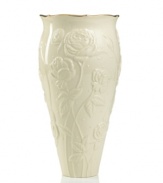 With lush roses and delicate dots carved in ivory porcelain, this classic vase offers a fine setting for fresh bouquets. A scalloped, gold-tipped rim adds an element of grandeur to every arrangement. Qualifies for Rebate
