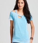 Cutouts at the neck and hemline toughen up this CHASER tee for a punk-meets-sweet look.