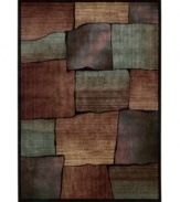 Blocks of bold, blended color build a spectacular design that's rich in artistic expression. This Nourison rug is made with exclusive, premium-quality Opulon™ yarns to create a densely woven and strikingly luxurious pile that provides years of fade-free style. Hand-carved details add textural interest.