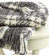 Beat the cold with this super-soft throw from Lauren by Ralph Lauren. Features a boucle plaid knit in gray and cream hues for a cozy addition anywhere in your home. Finished with a 3 fringe.