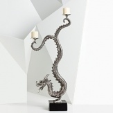 Natori's hand-cast dragon candelabra adds high drama and Eastern influence to your home's interior, and the hand-applied antiquing gives it artifact appeal.