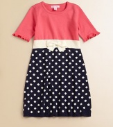 Polka dots and a charming bow breathe new life into this charming knit frock.ScoopneckShort sleeves with ruffled cuffsPullover styleWaistband with bow detailCottonMachine washImported