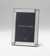 A modern design in polished silverplate, boldly punctuated with bolts at each corner. Black fabric backing Anti-tarnish finish Silver-plated RL closure Signature gift box Imported