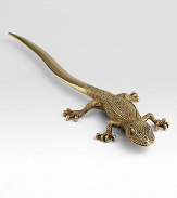 Textured brass gecko with smooth brass tail to open envelopes in style.Ruby Swarovski crystal eyes24 kt goldplate finish9.25 longImported
