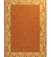 Safavieh takes classic beauty outside of the home with this elegant rug, created with a specially designed sisal weave. In a vibrant terracotta hue with natural accents, this beautiful piece makes the most of any outdoor patio, porch or balcony.