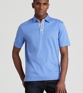 An essential polo gets a tweak from Michael Kors with check contrast details at the placket and under-collar, tailored for a slim, modern fit.