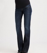 Stretch cotton five-pocket jeans have a comfy elastic waistband to take you through all nine months in style.THE FITStretchy panel at waistStandard bootcut proportionFront rise, about 12Back rise, about 14Inseam, about 34THE DETAILSFaux flyRivet detailFaded down center legsSignature stitching on back pocketsDistressed Pacific Ocean washNylon/spandex belly panelCotton/polyurethane denimMachine washMade in USA