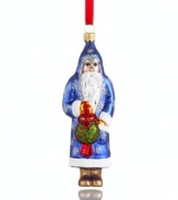 You just might catch Mommy kissing Santa Claus. With a kissing ball in-mitten, Father Christmas peers innocently out of his sparkle-studded robe in this glass Vaillancourt ornament.