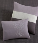Bold and modern, this Calvin Klein decorative pillow features tonal bands in stylish plum tones. Pillow comes stuffed and features an envelope closure.