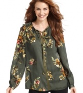 This petite tunic from Jones New York Signature features a smattering of pretty florals and a silky fabric. Pair it with your favorite jeans or pants for a complete look!