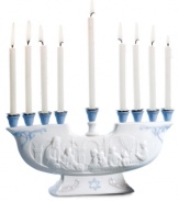 Make the festival of lights even more beautiful with an exquisite Lladro menorah. Handcrafted with embossed detail and delicate blue accents in white porcelain, it's a treasure to behold every holiday season.