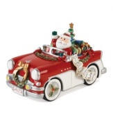 Fitz & Floyd presents an iconic symbol of Christmas with a modern twist: Santa is in a red convertible instead of the usual sleigh. Plus, this holiday collectible plays the classic carol Here Comes Santa Claus.