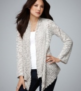 This petite cardigan by Style&co. mingles pointelle and burnout details to create a gorgeous texture. The draped fit of the asymmetrical hem makes a stylish statement, even when paired with your everyday denim.