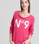 Boasting a chic No 9 graphic, this blissfully soft WILDFOX sweatshirt is a vibrant addition to your off-duty collection.