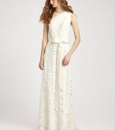 Pristine lace design in a one-shoulder silhouette with ribbon bow at the waist.Shirred shoulder detail Ribbon tie sash Side zipper Fully lined About 43 from natural waist 60% cotton/40% nylon Dry clean Imported