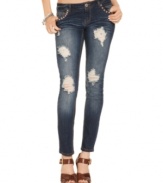 Looking for a pair of jeans with attitude? Shred detail and copper-tone studs pump-up this skinny leg style with tough-girl flavor! From Tinseltown.