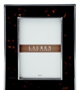 The alluring beauty of multi-faceted Tortoise shell finish presents a warm accent to clean stainless steel in this refined picture frame from Lauren by Ralph Lauren.