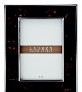 The alluring beauty of multi-faceted Tortoise shell finish presents a warm accent to clean stainless steel in this refined picture frame from Lauren by Ralph Lauren.