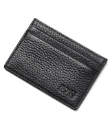 Soft, pebbled leather card case. Signature logo stamped on front.