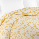 A pop art-inspired play of sunny yellow and bright white wing shapes on this DIANE von FURSTENBERG king duvet refreshes your bedroom decor with versatile contemporary style.