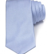 Patterned with bubble-like dots, this dapper tie invigorates your professional look with a dose of plush Italian silk.