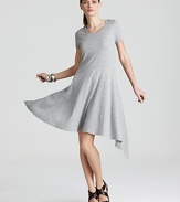 Give your style a twirl in this cotton DKNY dress. A high/low hem modernizes a feminine classic for a delicate yet daring statement piece.