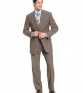 Constructed with neat, modern lines and accented with vintage sharkskin, this smart and sophisticated Michael Kors suit makes a great choice for the office or any formal occasion.