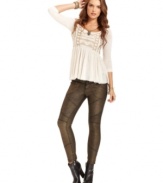 In a metallic fabric, these Free People textured skinny pants add a dose of stylish shine to your fall look!