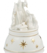 Holy family, holy night. Make your home sing with a beautiful porcelain music box sculpted with Jesus, Mary and Joseph. Twinkling gold stars against pure white infuse this Mikasa treasure with graceful spirit. Plays Silent Night.