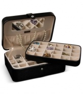 Beautiful inside and out, the Remy jewelry box houses innumerable trinkets between a lift-out drawer, divided sections and in-lid catch. A rich faux leather exterior and sparkling crystal snap add elegance to the practical storage solution by Mele & Co.