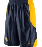 Get your game on while supporting your favorite NCAA team with these Marquette Golden Eagles basketball shorts featuring Dri-Fit technology from Nike.