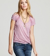 This Hurley tee flaunts mesh inserts at the neckline and back for visual interest and an unexpected hint of skin.