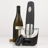 Both powerful and elegant, this cordless electric bottle opener is a must for hosting holiday parties and other events. It opens up to 80 bottles on a single charge, removing both natural and synthetic corks with equal ease. Its compact size and brushed steel accents make it a natural fit for the modern kitchen countertop. One-year limited warranty.
