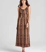 A snakeskin print lends exotic dimension to this VINCE CAMUTO maxi dress. Finish with strappy leather sandals to really work the tribal trend.