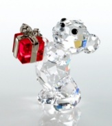 Pronounce staggering emotion to someone special with this adorable gift-toting bear. Designed by Peter Heidegger for Swarovski, this lovable fellow is crafted of fully faceted clear crystal with Jet-crystal eyes and nose and a Light Siam crystal present. The perfect gift for birthdays, holidays or an extra sweet thank-you. Meaures 1.5 x .75. Swarovski logo on bottom right foot.