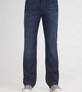 The standard against all other jeans will be measured in dark-washed denim with a relaxed fit and straight legs. Distressed edges and slight fading add a coveted worn-in look. Five-pocket design Sits higher on the waist Embroidered design on the back pockets Inseam, about 33 inseam Cotton/spandex; machine wash Imported