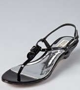 Two geometric embellishments adorn glossy patent leather on these dressed-up Badgley Mischka sandals, with a subtle wedge that takes the design to glamorous heights.