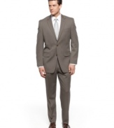 From the interview to the sales call to the corner office, this olive tonal stripe suit from Michael Kors is an easy, versatile choice.