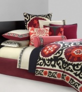 Evoking a traditional look with a modern touch, this Samarkand comforter set from N Natori takes inspiration from the ancient Eastern city of the same name. This Asian-themed set boasts an abstract floral and flourish motif in rich reds and oranges for a statement-making look in the bedroom.