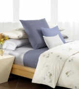 As peaceful as a spring meadow, the Calvin Klein Rhone comforter set exudes a natural sensibility with a modern flair. Stamped flowers in tones of lilac and fatigue dance across a tonal, combed cotton background for a look of relaxed beauty.