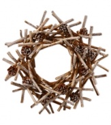 A cluster of twigs and pine cones create a comforting, wintry home accent in this holiday wreath from Winward.