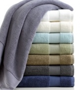 Indulge in the luxury of Calvin Klein with this Plush hand towel, featuring rich cotton for an ultra-soft hand and eight sophisticated colors to choose from.